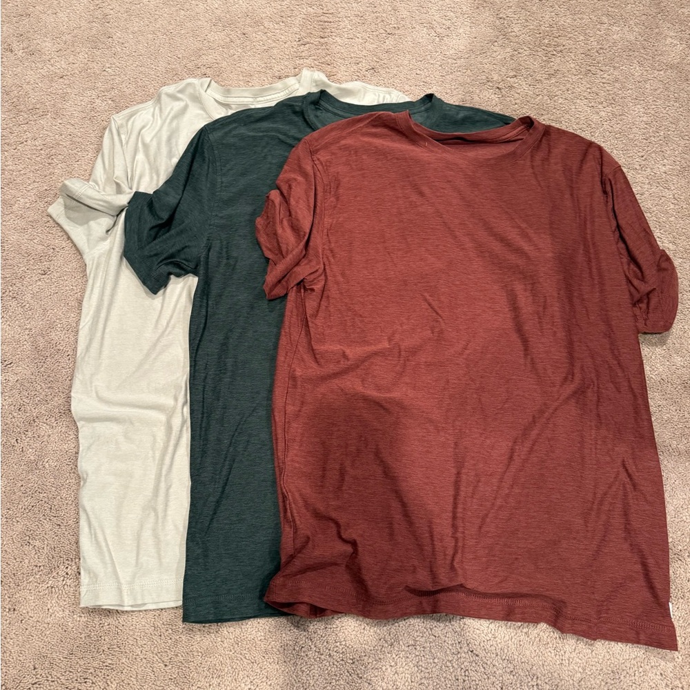 Set of Three Vuori Strato Tech T-Shirts in Red, Blue, and Cream